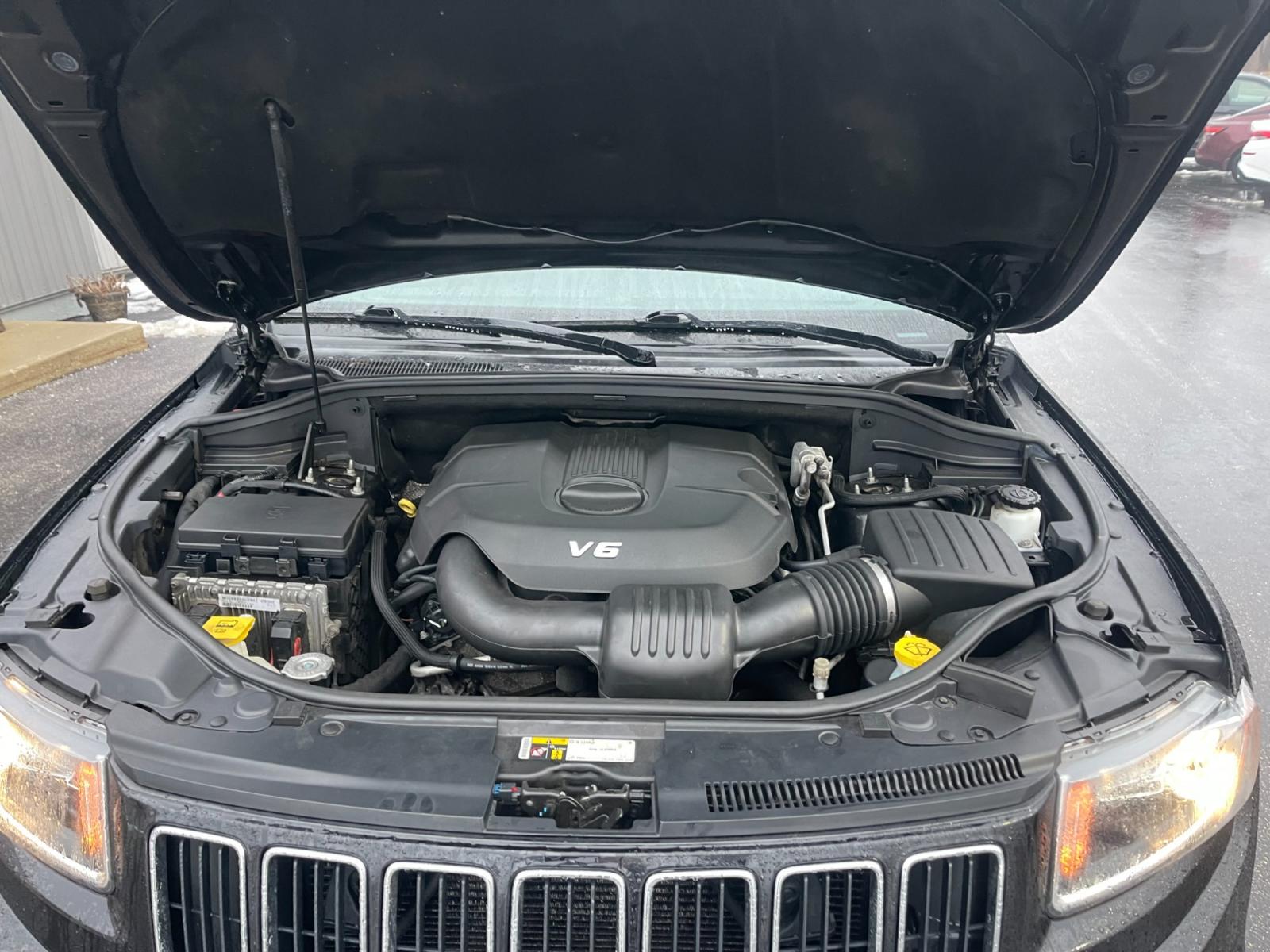 2015 Black /Black Jeep Grand Cherokee Limited 4WD (1C4RJFBG2FC) with an 3.6L V6 DOHC 24V FFV engine, 8-Speed Automatic transmission, located at 11115 Chardon Rd. , Chardon, OH, 44024, (440) 214-9705, 41.580246, -81.241943 - This 2015 Jeep Grand Cherokee Limited 4WD comes equipped with a 3.6L Pentastar V6 engine paired with an 8-speed automatic transmission, offering a blend of power and efficiency. It boasts a luxurious leather interior with both front and rear heated seats for comfort in various climates. For convenie - Photo #16